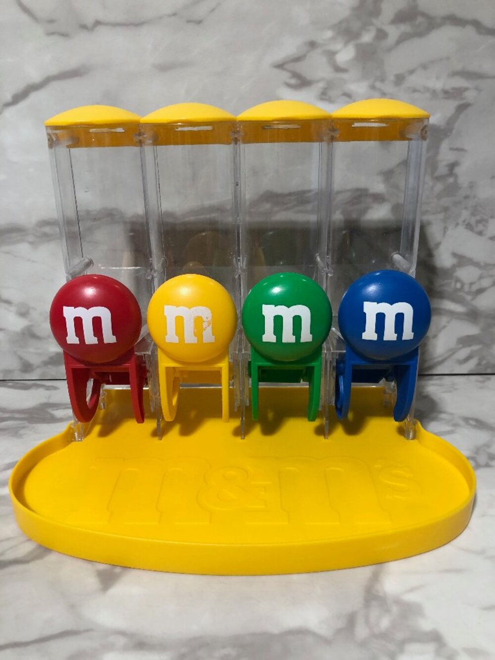 M&M's World Four Tube Yellow Candy Dispenser 4 colors green blue red chocolate